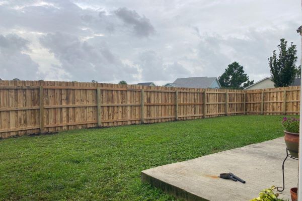 Wood fence installation in Milton Florida